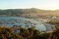 ARRAIAL DO CABO, RIO DE JANEIRO, BRAZIL- MARCH 21, 2016: View from a hill of the village of Arraial and its harbor at sunset. Royalty Free Stock Photo