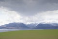 Arran viewed from Rothesay in Isle of Bute under dark clouds Royalty Free Stock Photo
