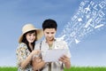 Arrange honeymoon travel from electronic tablet Royalty Free Stock Photo