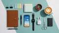 Arranged collection of office and tech items on a blue and white Royalty Free Stock Photo