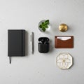 Arranged flat lay on a light speckled surface. Items include a black Royalty Free Stock Photo