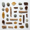 Arranged on a flat surface, the display features smooth gray pebbles, dried brown Royalty Free Stock Photo