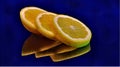Arranged lemon on a glass surface. Royalty Free Stock Photo