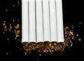 Arranged in a row cigarettes Royalty Free Stock Photo