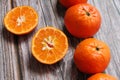 Arranged in a row of mandarin, orange citrus fruit, juicy fruit full of vitamins, tangerine cut in half