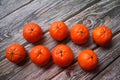 Arranged in a row of mandarin, orange citrus fruit, juicy fruit full of vitamins, tangerine cut in half
