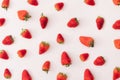 Arranged strawberries on a white background