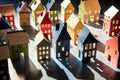 arranged toy houses showing lengthened shadows