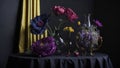 Arrangement of beautiful flowers in the black vase adds a touch of elegance and grace to the table, creating a captivating