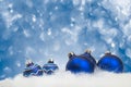 Arrangement of blue Christmas ornaments on blue background Royalty Free Stock Photo