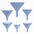 Arrangement of blue funnels of different sizes for liquid transfer on white background Royalty Free Stock Photo
