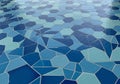 An arrangement of blue and turquoise tiles, featuring a combination of hexagonal and irregular Royalty Free Stock Photo
