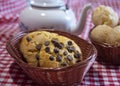 Arrangement with breads, sweets and teapot on a red and white towel Royalty Free Stock Photo