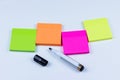 Arrangement of colored sticky notes with marker pen Royalty Free Stock Photo
