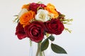 Arrangement of Colorful Silk Faux Flowers on White