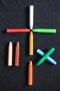 The arrangement of crayons forms a mathematical sign Royalty Free Stock Photo