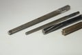 Arrangement with different sized tapered and cylindrical reamers Royalty Free Stock Photo