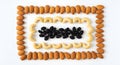 Arrangement of dried fruits and raisins in a square pattern Royalty Free Stock Photo