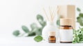 The arrangement features essential oil bottles and a diffuser alongside fresh greenery, creating a serene atmosphere Royalty Free Stock Photo