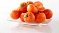 Arrangement of fresh tomatoes on a plate Royalty Free Stock Photo