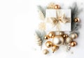 An arrangement of of gold and silver Christmas decorations Gift box on white background. Flat lay. Copy space. with generative Ai Royalty Free Stock Photo