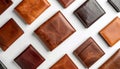 Arrangement of Leather Wallets in Tones of Brown and Black on White Seamless Background Royalty Free Stock Photo