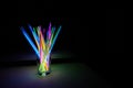 Arrangement of multi-colored glow sticks