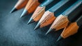 Several pencils lined up on a black surface Royalty Free Stock Photo