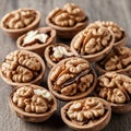 Walnut Juglans regia shells displaying their kernels on a wooden Royalty Free Stock Photo
