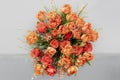 Orange tulips, roses, broom in spring flowers bouquet. Spring dream with beautiful filled orange yellow tulips, top view. Royalty Free Stock Photo