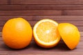 Arrangement of orange isolated on wooden background. Healthy food. A mix of fresh fruit. Group of citrus fruits. Vegetarian, raw. Royalty Free Stock Photo