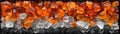 An arrangement of orange, white, and black glass stones forms a striking and dynamic composition Royalty Free Stock Photo