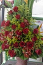 Arrangement of roses in a basket placed in market stall Royalty Free Stock Photo