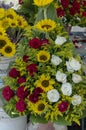 Arrangement of roses in a basket placed in market stall Royalty Free Stock Photo