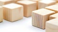 Arrangement of small wooden blocks in a row on solid textured background for easy text placement