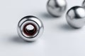 Arrangement of steel ball bearings on white surface Royalty Free Stock Photo