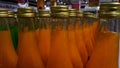 Arrangement of syrup bottles in supermarket