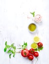 An arrangement of tomatoes, basil, olive oil and himalayan salt Royalty Free Stock Photo