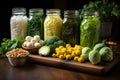An arrangement of vibrant vegetables, spices, salt and fermentation containers for homemade fermented vegetables