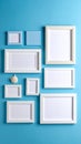 Arrangement of White Picture Frames on Blue Background Featuring a Seashell Coastal Themed Mockup Royalty Free Stock Photo