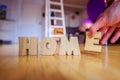 New Home: Arranging HOME letters Royalty Free Stock Photo
