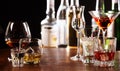 Array of alcoholic beverages in glasses at a bar Royalty Free Stock Photo