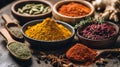 An Array of Aromatic Spices Displayed in Rustic Bowls and Spoons Royalty Free Stock Photo