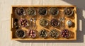 Array of assorted loose-leaf teas and dried botanicals arranged on a rectangular Royalty Free Stock Photo