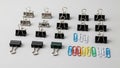 Clips are predominantly placed in four rows while the paper clips are set Royalty Free Stock Photo