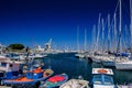Array of boats docked in the tranquil waters near a majestic pier, Palermo, Sicily, Italy