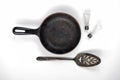 An Array of Cast Iron Skillets and Antique Kitchen Utensils Royalty Free Stock Photo