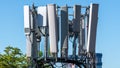 An array of cell phone antennas in a large city Royalty Free Stock Photo