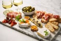 an array of cold tapas on a marble countertop Royalty Free Stock Photo