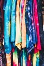 Array of colorful unisex tie-dye shirts Royalty Free Stock Photo